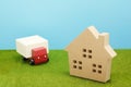 Toy car truck and house on green grass. Royalty Free Stock Photo