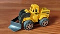 A toy car that is usually used to remove sand or the rest of the stones on the road 2