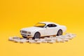 Toy car and wooden blocks on a yellow background. Generative AI Royalty Free Stock Photo