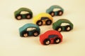 Toy cars moving in one direction together