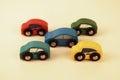 Toy cars moving in one direction together