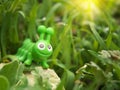 Toy caterpillar in grass. Royalty Free Stock Photo
