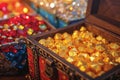 toy chest styled as a treasure box filled with play gold and jewels Royalty Free Stock Photo