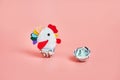 toy chicken and eggshells with 100 dollar bills. concept. pink background Royalty Free Stock Photo