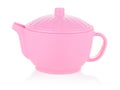 Toy children's teapot pink close-up. Isolate of a plastic teapot on a white background. Layout for the designer. Catalog Royalty Free Stock Photo