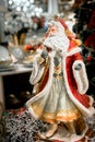 Toy christmas decor and decorations for home. merry santa dancing and spinning in the dance. macro photo. Royalty Free Stock Photo