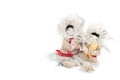 Toy Chukchi with fish and baby in his arms Royalty Free Stock Photo