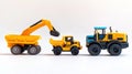 toy construction vehicles in a row Royalty Free Stock Photo