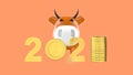 A toy cow model and columns of gold coins and 2021 banner