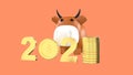 A toy cow model and columns of gold coins and 2021 banner