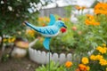 Garden Ratchet - the repeller of birds, in the form of a bird, against the backdrop of the garden.