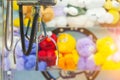 Toy crane vending machine, claw game or cabinet to catch the toys. Shopping, holiday activity, game of chance. Selective focus on Royalty Free Stock Photo