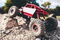 Toy crawler overcoming rock close-up