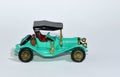 Toy diecast model of a Green 1911 Maxwell Roadster a