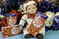 Sailor doll with three vintage boxes of cracker jack