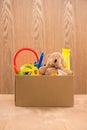 Toy. Donation box with unwanted items for poor Royalty Free Stock Photo