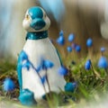 Toy duck with spring flowers Royalty Free Stock Photo
