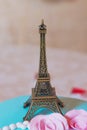 Eiffel tower souvenir toy, isolated on a yellow background Royalty Free Stock Photo