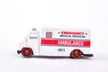 Toy emergency ambulance, white background. Royalty Free Stock Photo