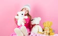 Toy every child dreaming. Happy childhood concept. Child small girl playful hold teddy bear plush toy. Why kids love Royalty Free Stock Photo