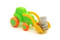 The toy excavator loads money