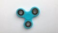 Toy fidget spiner on a white background