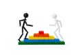 Toy Figures Climbing Pyramid: Hierarchy and Career Growth Royalty Free Stock Photo