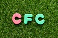 Toy letter in word CFC abbreviation of Chlorofluorocarbon on green grass background Royalty Free Stock Photo