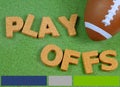 Toy football on grass background with red white and blue color bars across the bottom to match a football league team.