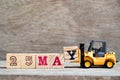 Toy forklift hold block Y to complete word 25 may on wood background (Concept for calendar date for month May)