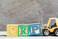 Toy forklift hold block P to complete word CRP abbreviation of C-Reactive Protein Test on wood background Royalty Free Stock Photo