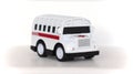 Toy in the form of a medical ambulance on a white background