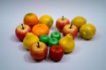 Toy fruits on light blue background Royalty Free Stock Photo