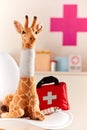 Toy giraffe with bandaged neck