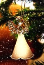 Toy glass angel decoration on the xmas tree Royalty Free Stock Photo