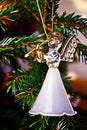 Toy glass angel decoration on the xmas tree Royalty Free Stock Photo