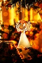 Toy glass angel decoration on the xmas tree Royalty Free Stock Photo