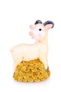 Toy goat with golden coins