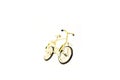 Toy gold bicycle. Isolated on white background Royalty Free Stock Photo