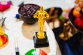 toy golden oscar statuette. humorous gift for movie lover.