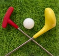 Toy Golf Club with ball on the grass Royalty Free Stock Photo