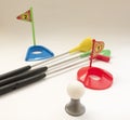 Toy Golf set with multi-colored sticks, balls, flags Royalty Free Stock Photo