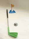 Toy Golf shot into the hole with a stick Iron Royalty Free Stock Photo