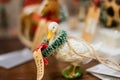 A toy goose in a Christmas wreath on a shelf Royalty Free Stock Photo