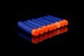 Toy gun blue rubber bullets Royalty Free Stock Photo