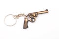 Toy gun with key chain isolated on white Royalty Free Stock Photo