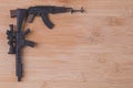 Toy gun Model guns figure on wood background for write board Royalty Free Stock Photo