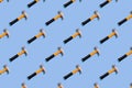 Toy Hammer Regular Pattern Blue Background Construction Minimal Concept Trendy sunlight Royalty Free Stock Photo