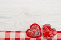 Toy heart and ribbon over wooden