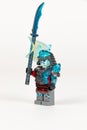 Toy hero general vex with a scimitar in armor from a set of lego ninjago on a white background. close-up. selective focus